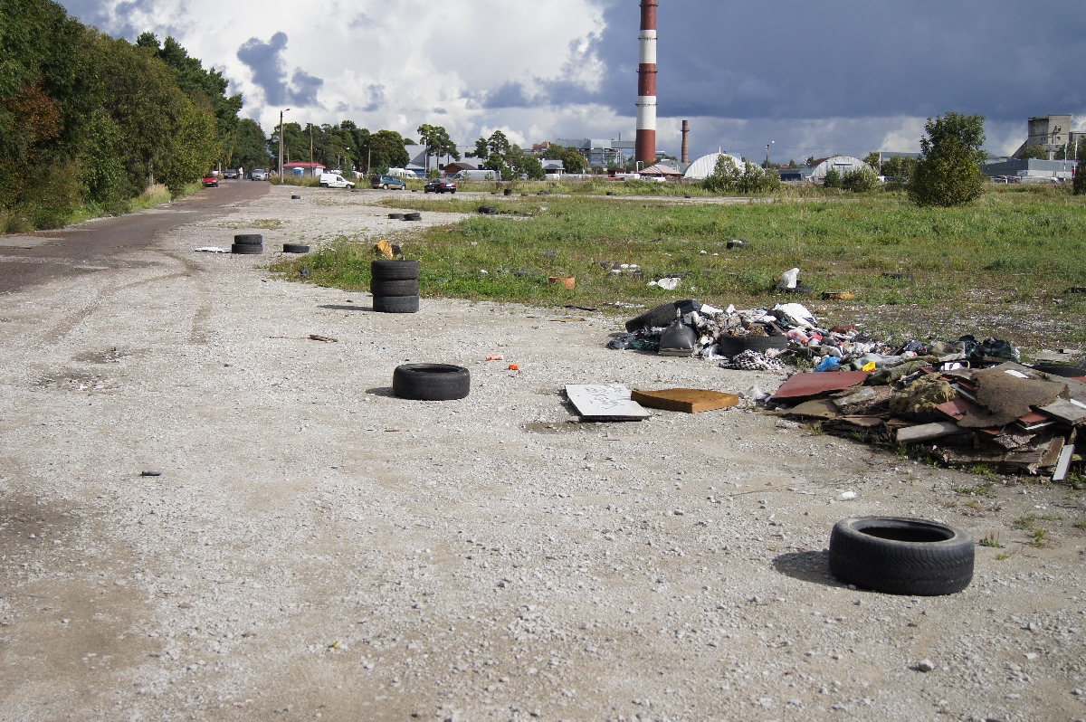 Heaps of garbage next to the car market. Astangu Military Base.