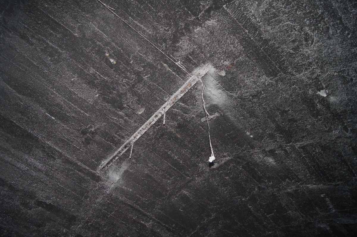 Inside the tunnel. Remains of electric lighting.  Astangu Military Base.